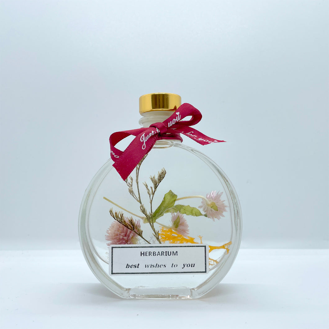 Floating flowers in clear and mixed colors (small round bottle shape)